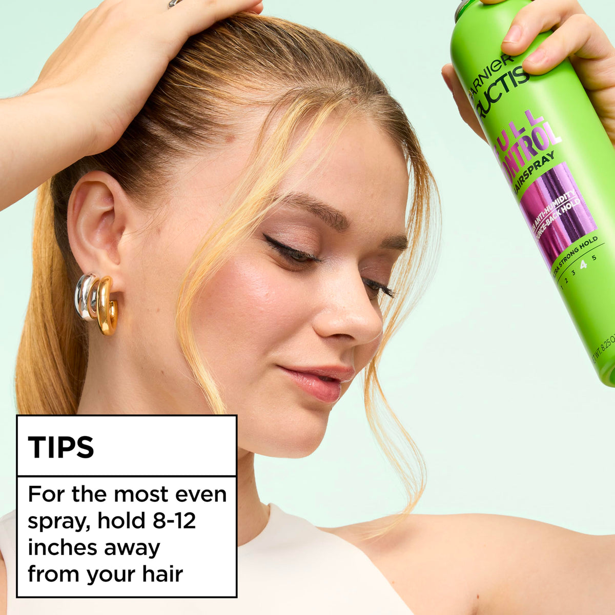 Garnier Fructis lifestyle beach hair image showing humidity resistance and active wearability