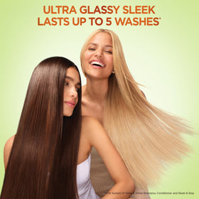 Garnier Fructis lifestyle scene in humid weather showing long‑lasting sleek hair