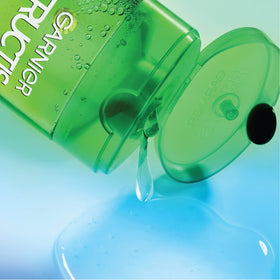 Garnier Fructis bottle on bathroom shelf demonstrating daily routine convenience benefit