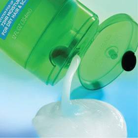 Garnier Fructis bottle with recycled plastic badge highlighting sustainable packaging