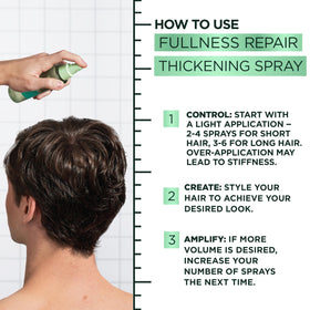 Garnier Fructis held in hand for size comparison and travel-friendly benefit