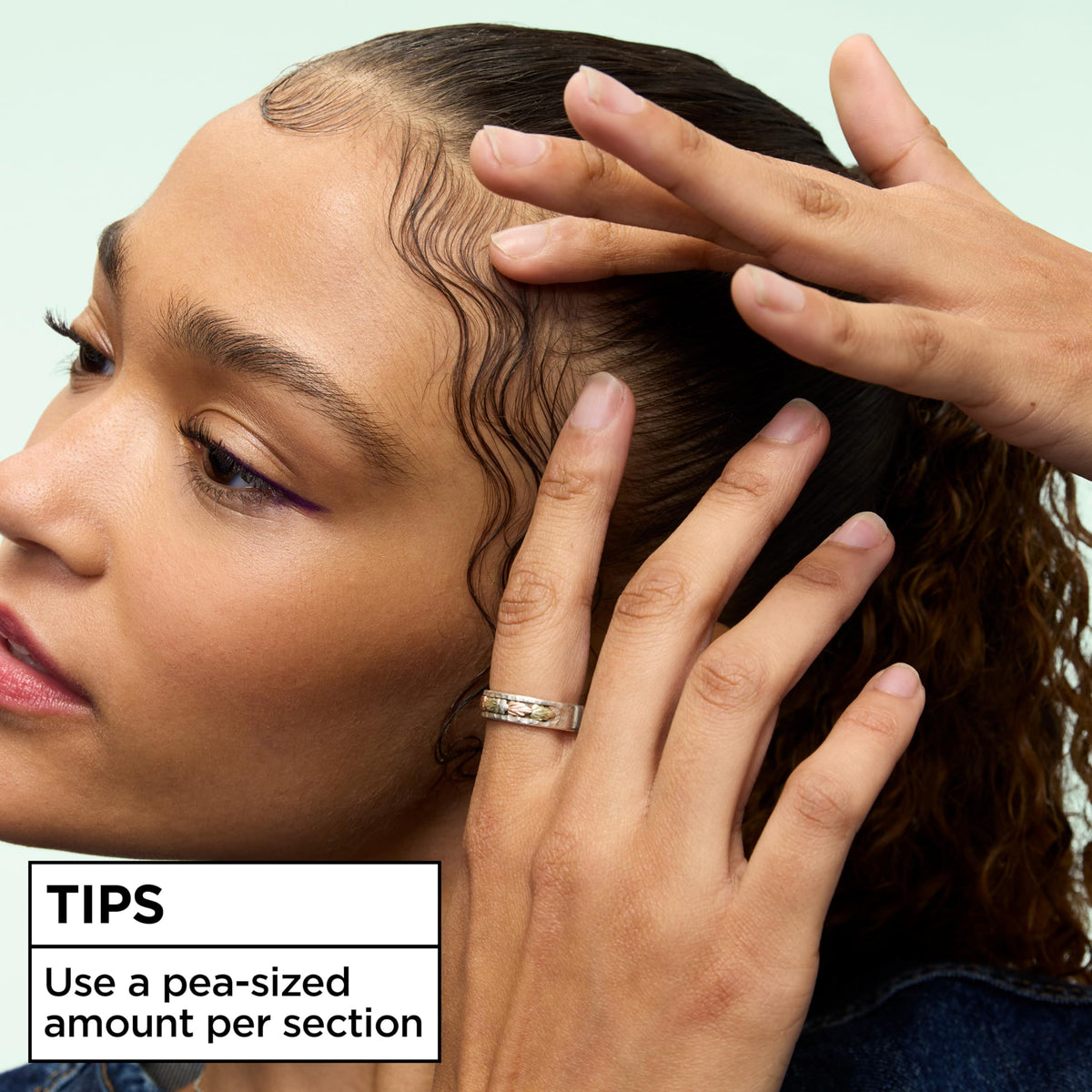 Garnier Fructis scrunching technique creating defined curls