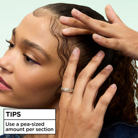 Garnier Fructis scrunching technique creating defined curls