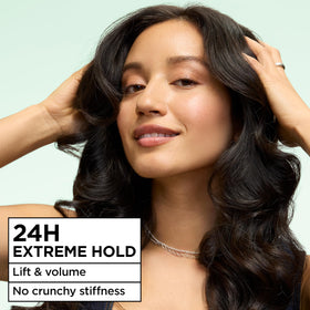 Garnier Fructis spray action on hair providing instant lift