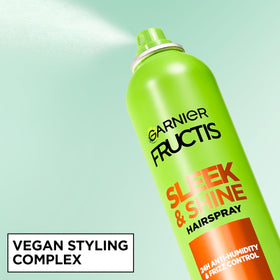 Garnier Fructis spray mist action illustrating fine mist for lightweight hold