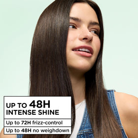 Garnier Fructis spray nozzle closeup delivering a fine mist for even shine