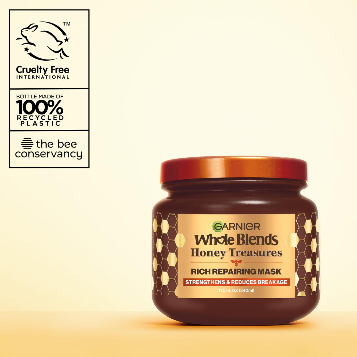 Garnier whole blends hand holding tub showing scale and travel convenience