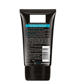 Garnier tube on bathroom shelf in a male grooming setup conveying daily routine