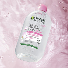 Garnier in-use with cotton pad removing makeup for quick, gentle cleansing