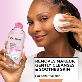 Garnier bottle pouring micellar water onto a cotton pad for easy removal