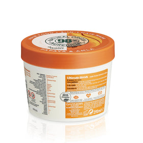 Garnier jar in hand demonstrating 390ml value and long-lasting supply benefit