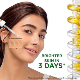 Garnier 30ml bottle next to a coin showing compact travel-friendly benefit