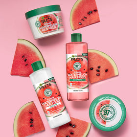 Garnier Watermelon Hair Food applied to damp hair demonstrating detangling and added shine benefits during styling
