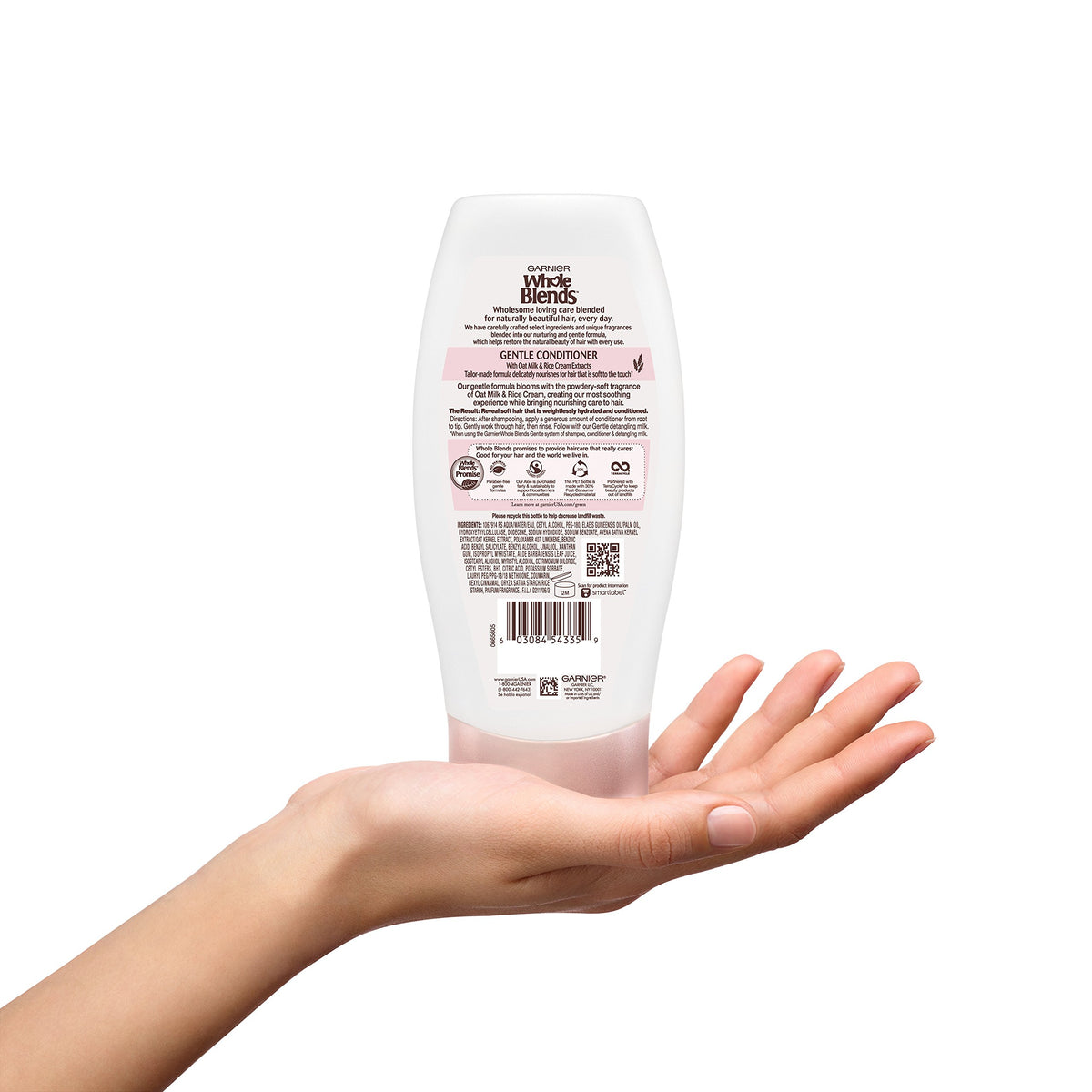Garnier conditioner staged next to shampoo in bathroom for routine
