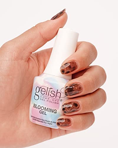 Nail technician using Gelish Blooming Gel in salon to create watercolor nail art efficiently