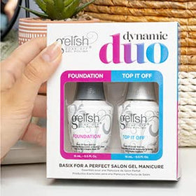 Gelish bottles held in hand for size comparison showing ergonomic cap and comfortable grip advantage