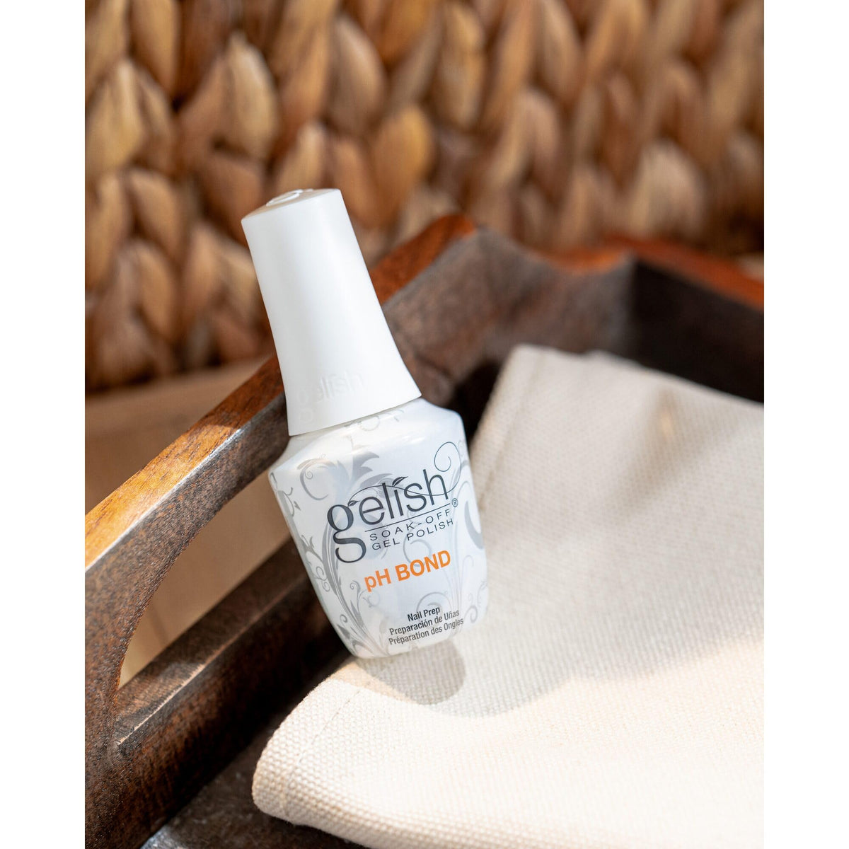 Gelish pH Bond application close-up on nail plate showing precise, quick-dry coverage to improve adhesion