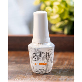 Gelish pH Bond size comparison with hand showing bottle scale and convenience for multiple manicures
