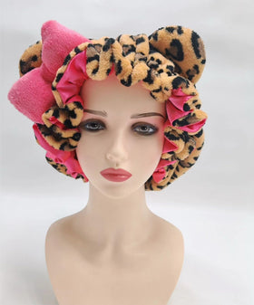 Generic close-up of smooth pink satin lining offering moisture retention benefit
