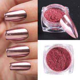 Generic brand hand applying chrome powder with sponge for mirror shine