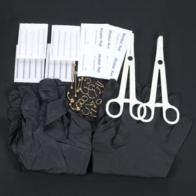 Generic clamps and alcohol pads setup for quick, clean piercing prep