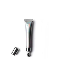 Generic extreme lipgloss front packaging showing clear gloss and volume effect
