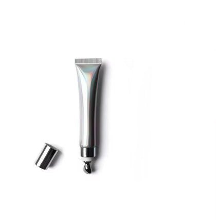Generic extreme lipgloss front packaging showing clear gloss and volume effect
