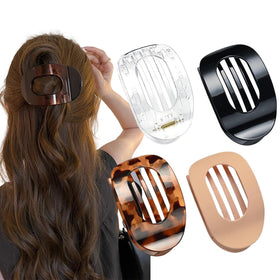 Generic front view of four duckbill hair clips showing colors and matte finish for versatile styling