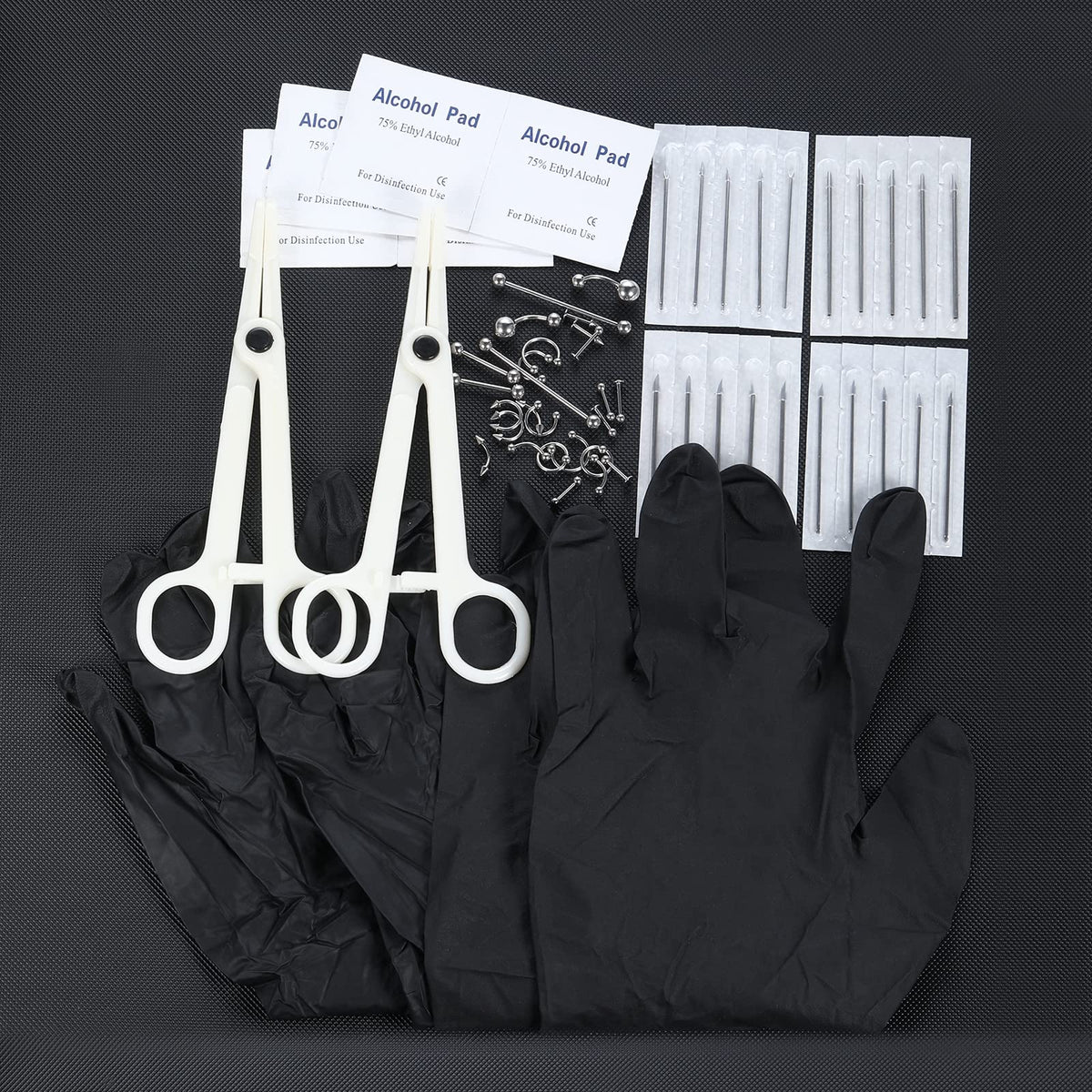 Generic labret studs and BCRs on black background, brand variety for multiple piercings