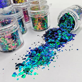 Generic brand tumbler with resin-embedded flakes demonstrating lasting shine