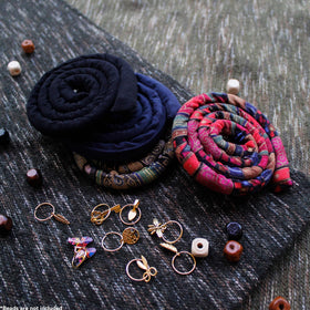 Generic spiral lock wrapped around a high ponytail demonstrating secure double-wrap technique