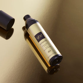 ghd Bodyguard bottle on bathroom vanity suggesting daily styling routine