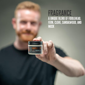 GIBS Phantom jar held in hand showing compact 4 oz travel-friendly size