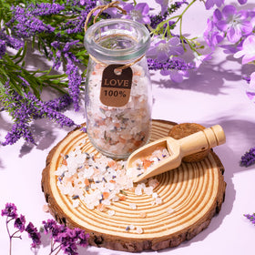 GiftPeak bath bomb and salts arranged to show fizzing bath experience