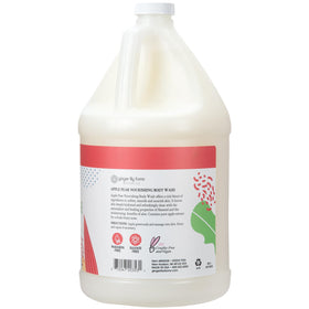 Ginger Lily Farms pouring refill into dispenser for economical, low-waste use