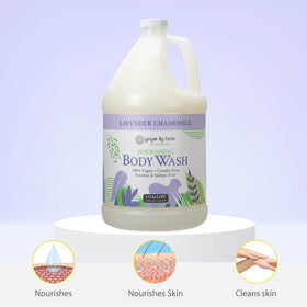 Ginger Lily Farms gallon beside dispenser in bathroom, ideal for gyms and home use