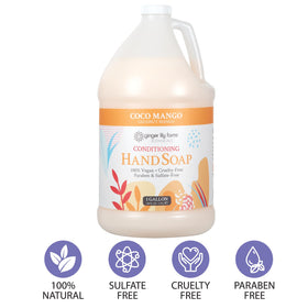 Person dispensing Ginger Lily Farms soap into hands for cleansing benefit
