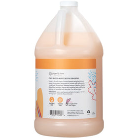 Ginger Lily Farms shampoo pouring from gallon into dispenser, lowers waste