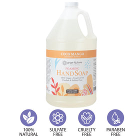 Ginger Lily Farms gallon being poured into a foaming dispenser in kitchen, convenient refill for home use