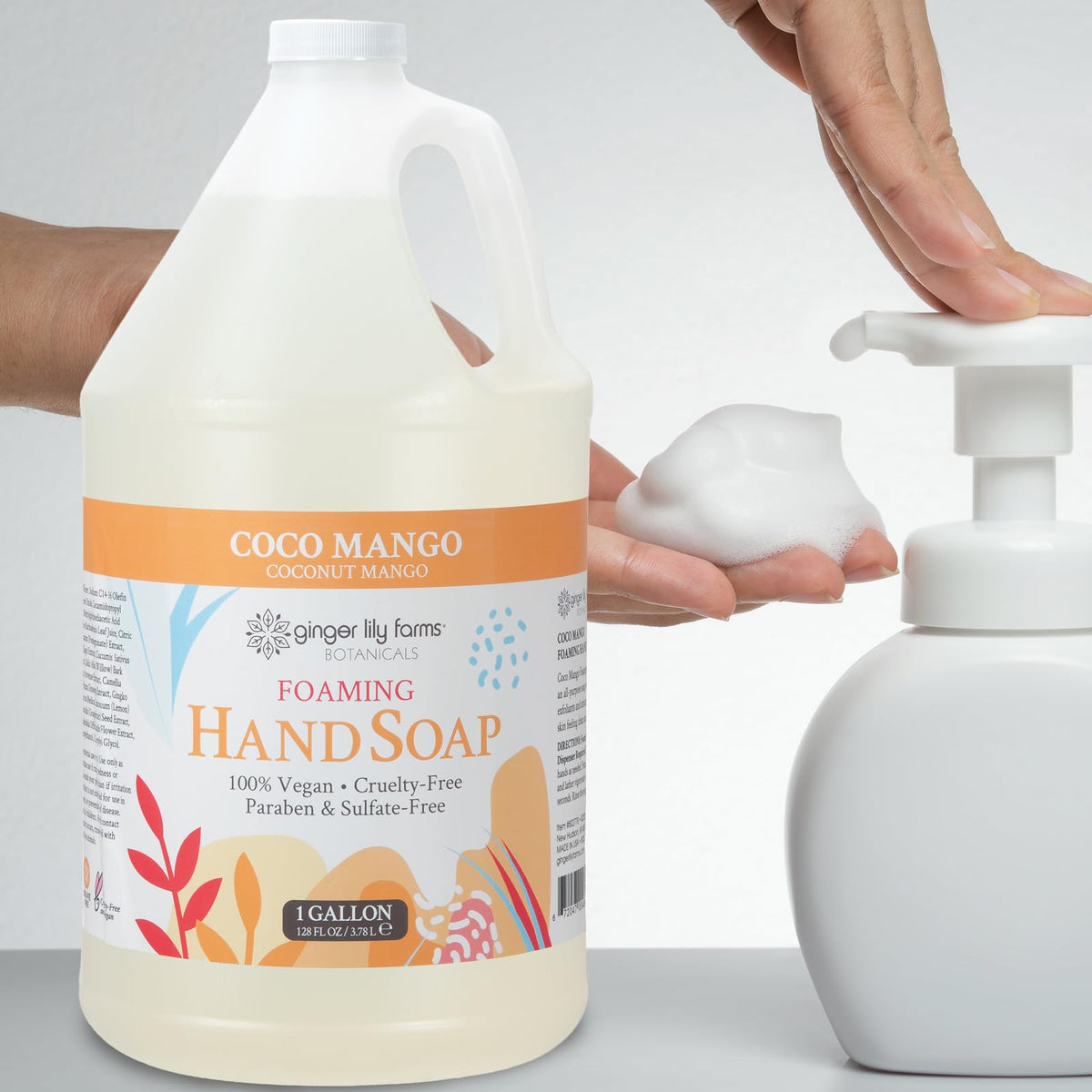 Ginger Lily Farms botanical ingredients and mango-coconut visual conveying natural extracts and skin conditioning benefits