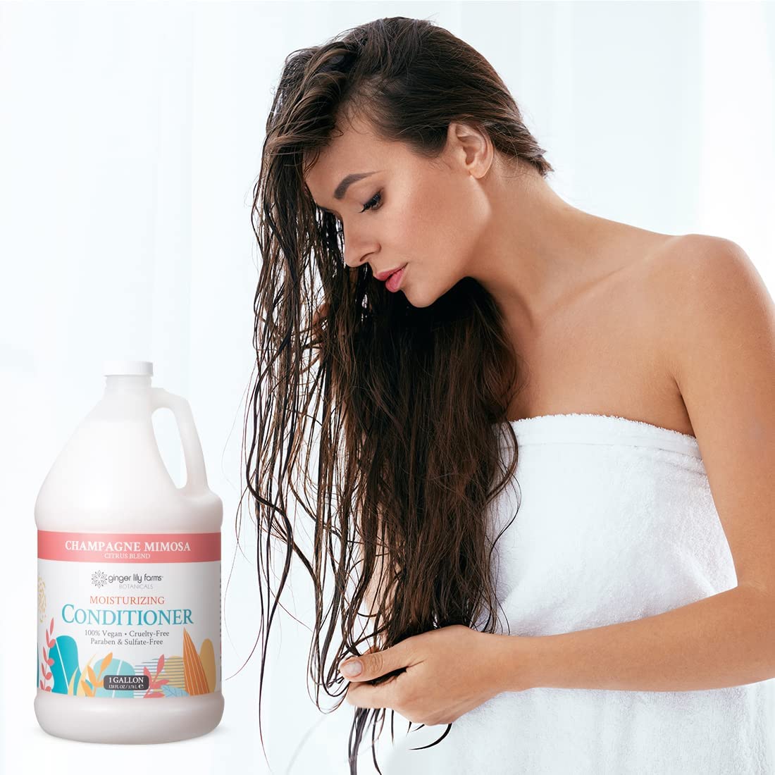 Ginger Lily Farms shower dispensers in bathroom showing guest-friendly refill benefit