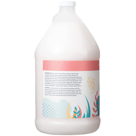Ginger Lily Farms pouring refill into dispenser for economical, low-waste benefit