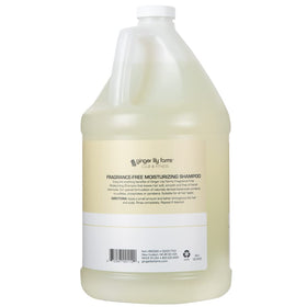 Ginger Lily Farms shampoo being poured from gallon refill into dispenser for easy refills