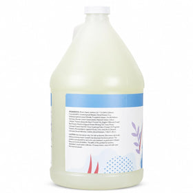Ginger Lily Farms pouring refill into dispenser to save waste and money
