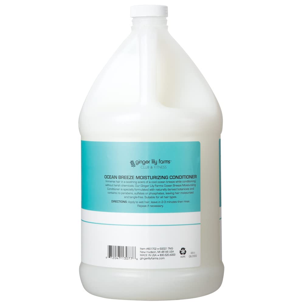 Ginger Lily Farms conditioner being poured into a dispenser for economical refills