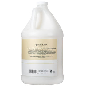 Ginger Lily Farms refill with pump dispensing into a shower dispenser for easy use