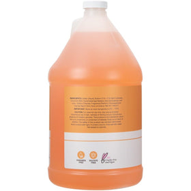 Ginger Lily Farms refill pouring into a dispenser demonstrating easy, low-waste refill