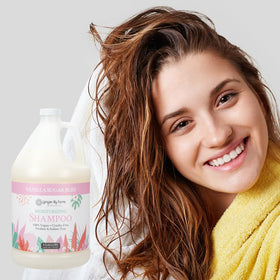 Ginger Lily Farms gallon on salon backbar conveying professional use and eco-friendly refill
