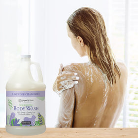 Ginger Lily Farms gallon held in hands for scale, emphasizes large economical size