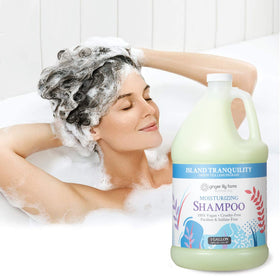 Ginger Lily Farms shampoo bottle in a spa bathroom promoting calming scent experience
